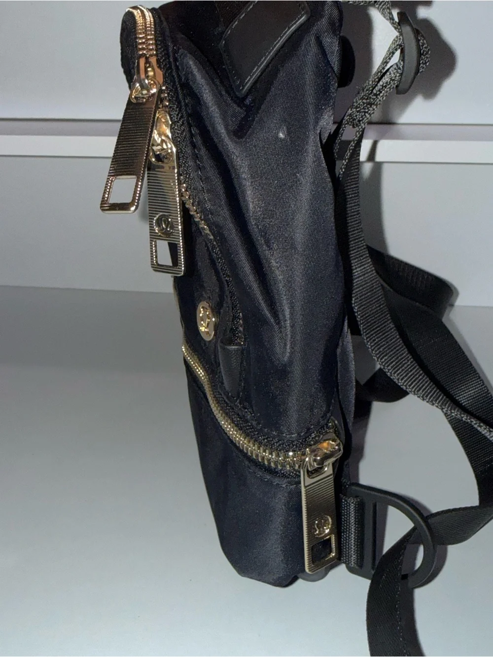 lululemon athletica Black Mini Backpack with Gold Zippers